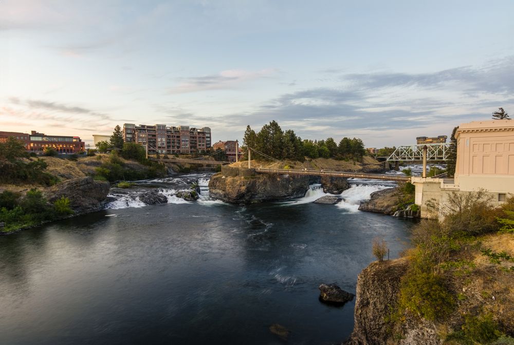 Spokane Falls and the downtown skyline at sunset