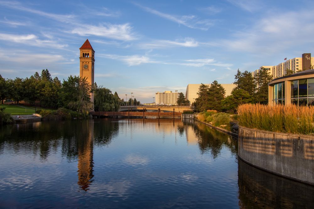 The Riverfront Park clocktower reflected in the Spokane River